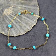 Gold-toned chain  turquoise-colored beads