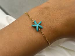 Gold-toned bracelet  turquoise starfish