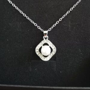 Pearl and cubic zirconia pendant necklace.