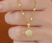 Diamante planet necklace.